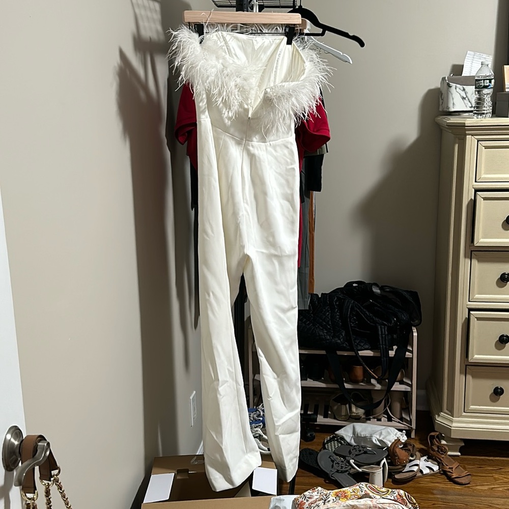 Nadine Merabi: Colette White Jump Suit with belt